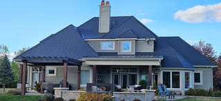 Deep Charcoal Interlock Slate aluminum roof on a Deep Charcoal Interlock Slate metal roof on a rural, Sussex, New Brunswick