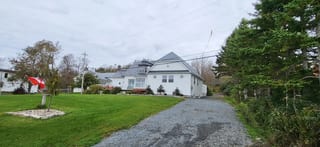 Charcoal Grey Interlock Slate aluminum roof on the home, East LaHave, Nova Scotia