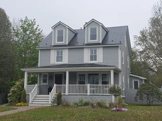 Black Interlock Slate aluminum roof on the home, Mahone Bay, Nova Scotia