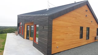 Deep Charcoal Interlock Standing Seam aluminum roof on a house with a metal roof in Cow Bay, Nova Scotia, Cow Bay, Nova Scotia