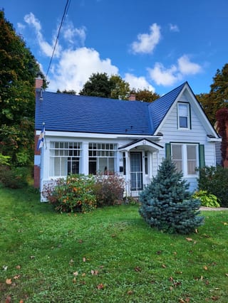 Black Interlock Slate aluminum roof on the home with chimney, Kentville, Nova Scotia