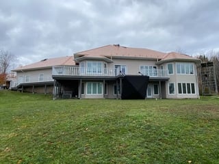 Copper Penny Interlock Slate aluminum roof on the home with ridge cap, Wolfville, Nova Scotia