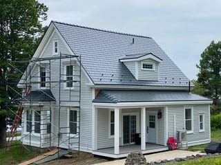 Deep Charcoal Interlock Slate aluminum roof being installed on the home, East LaHave, Nova Scotia