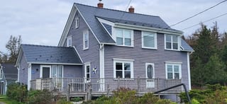 Deep Charcoal Interlock Cedar Shingle aluminum roof on the home, Kingsburg, Nova Scotia