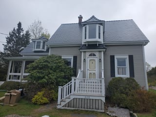 Black Interlock Slate aluminum roof on the home, Lower Rose Bay, Nova Scotia