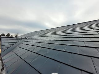 Black Interlock Slate aluminum roof on the home, Hammonds Plains, Nova Scotia