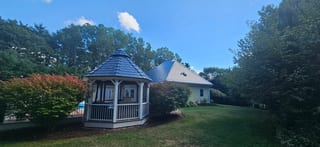 Deep Charcoal Interlock Slate aluminum roof on the home, Upper LaHave, Nova Scotia