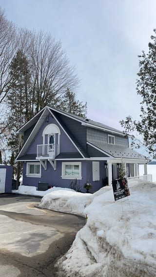 Musket Grey Interlock Cedar Shingle aluminum roof on a grey two-storey chalet with a Musket Grey metal roof, Severn, Ontario
