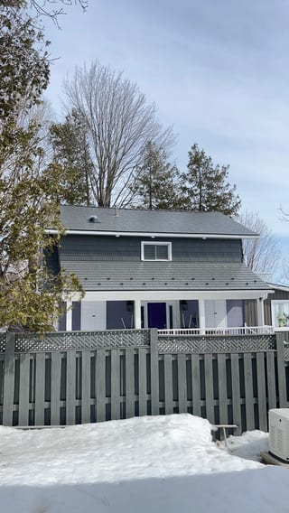 Musket Grey Interlock Cedar Shingle aluminum roof on a two-storey home with a Musket Grey metal roof and a grey, Severn, Ontario