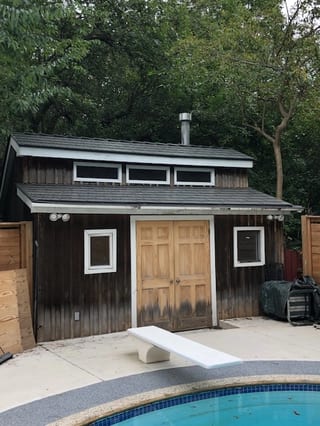 Musket Grey Interlock Cedar Shingle aluminum roof on a two-storey home with a metal roof in a suburban setting, Mississauga, Ontario