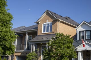 Tudor Brown Interlock Cedar Shingle aluminum roof on a Tudor brown Interlock roof on a two-storey home in a, Stouffville, Ontario