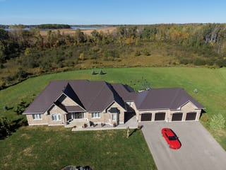 Tudor Brown Interlock Slate aluminum roof on a Tudor Brown metal roof on a ranch-style house in a, Kawartha Lakes, Ontario