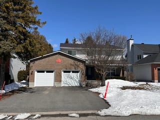 Colonial Brown Interlock Shingle aluminum roof on a brown two-storey home with a metal roof in Stittsville, Stittsville, Ontario