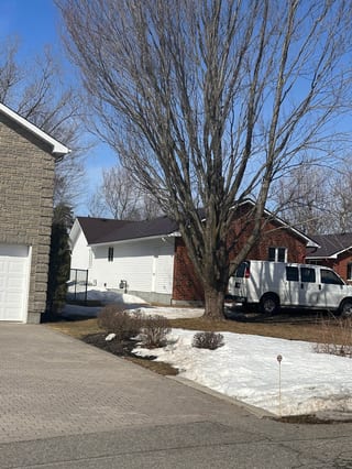 Colonial Brown Interlock Cedar Shingle aluminum roof on a brown colonial home with a metal roof in Ottawa, Ottawa, Ontario