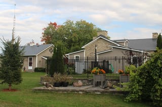 Deep Charcoal Interlock Slate aluminum roof on a single-storey home with a metal roof in a suburban, Carleton Place, Ontario