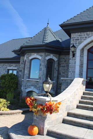Deep Charcoal Interlock Slate aluminum roof on a modern home with a metal roof in a suburban/urban area, Alexandria, Ontario