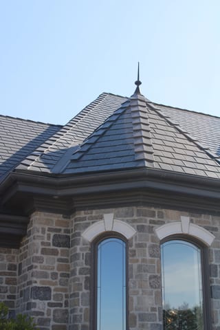 Deep Charcoal Interlock Slate aluminum roof on a two-storey Colonial home with a slate roof in a rural area, Alexandria, Ontario