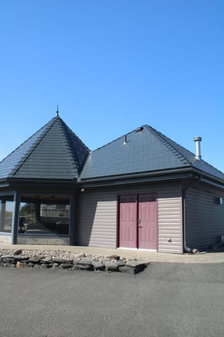 Deep Charcoal Interlock Slate aluminum roof on a two-storey home with a Deep Charcoal Interlock Slate roof, Alexandria, Ontario