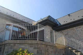 Deep Charcoal Interlock Slate aluminum roof on a colonial home with a deep charcoal metal roof in a, Alexandria, Ontario