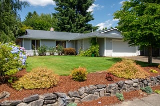 Charcoal Grey Interlock Shingle aluminum roof on a grey single-storey ranch home with a metal roof among, Hillsboro, Oregon