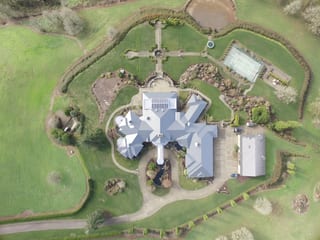 Deep Charcoal Interlock IB Membrane aluminum roof on a modern home with a metal roof on a rural property, Turner, Oregon