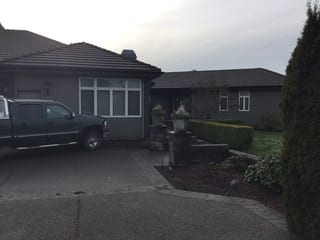 Before: a leaking concrete tile roof on the home, Turner, Oregon, ahead of a Deep Charcoal Interlock IB Membrane aluminum roof