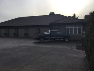 Before: a leaking concrete tile roof on the home, Turner, Oregon, ahead of a Deep Charcoal Interlock IB Membrane aluminum roof