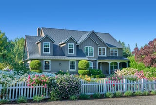 Deep Charcoal Interlock Shake aluminum roof on a two-storey Colonial home with dormers in a forested, Portland, Oregon