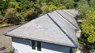Before: a leaking natural slate roof on the home, Portland, Oregon, ahead of a Deep Charcoal Interlock Slate aluminum roof