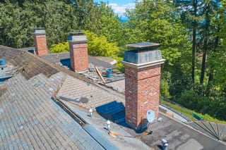 Before: a leaking natural slate roof on the home, Portland, Oregon, ahead of a Deep Charcoal Interlock Slate aluminum roof