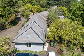 Before: a leaking natural slate roof on the home, Portland, Oregon, ahead of a Deep Charcoal Interlock Slate aluminum roof