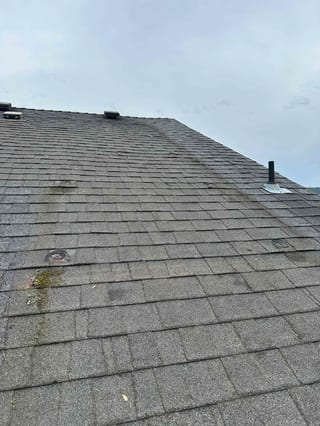 Before: a leaking asphalt shingle roof on the home, Newberg, Oregon, ahead of a Deep Charcoal Interlock Cedar Shingle aluminum roof