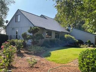 Deep Charcoal Interlock Slate aluminum roof on a Deep Charcoal Interlock Slate metal roof on a Ranch-style, Amity, Oregon
