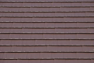 Colonial Brown Interlock Cedar Shingle aluminum roof on a Colonial brown metal roof on a single-family home in, Shoreline, Washington