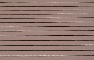 Colonial Brown Interlock Cedar Shingle aluminum roof on a Colonial brown single-family home with two stories among, Shoreline, Washington