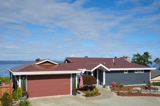 Aged Copper Interlock Cedar Shingle aluminum roof on a single-storey home with a metal roof in Burien, Washington, Burien, Washington
