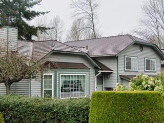 Colonial Brown Interlock Cedar Shingle aluminum roof on a colonial home with a colonial brown metal roof in a, Renton, Washington