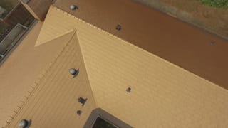 Aged Copper Interlock Cedar Shingle aluminum roof on a modern home with a copper metal roof in Bellevue,, Bellevue, Washington