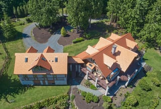 Copper Penny Interlock Shake aluminum roof on a single-family home with copper penny metal roof in a, Bellingham, Washington