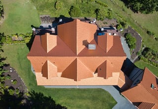 Copper Penny Interlock Shake aluminum roof on a copper penny metal roof on a craftsman home in rural, Bellingham, Washington