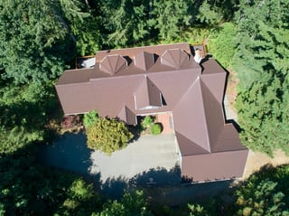 Colonial Brown Interlock Shake aluminum roof on a colonial brown metal roof on a single family home in a, Gig Harbor, Washington