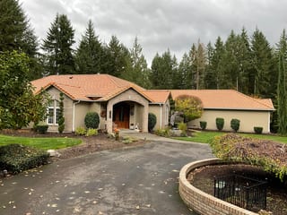 Copper Penny Interlock Shake aluminum roof on a tan ranch style home with a copper penny metal roof among, Auburn, Washington