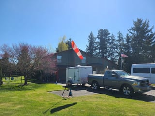 Deep Charcoal Interlock Slate aluminum roof on a two-storey home with dormers in a forested suburban, Lynnwood, Washington