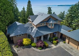 Deep Charcoal Interlock Slate aluminum roof on a modern single-family home with a Deep Charcoal metal roof, Blaine, Washington