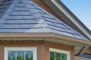 Deep Charcoal Interlock Slate aluminum roof on a modern home with a deep charcoal metal roof in Blaine,, Blaine, Washington