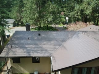 Tudor Brown Interlock Slate aluminum roof on a Tudor Brown metal roof on a ranch-style house in a, University Place, Washington