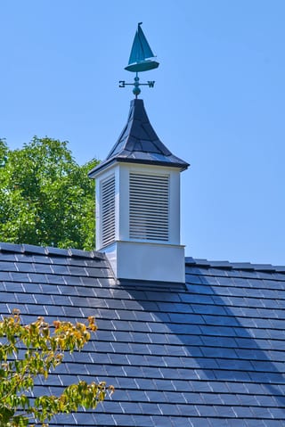 Black Interlock Slate aluminum roof on a black single-family home with a metal roof in a rural, Enumclaw, Washington