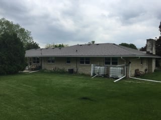 Colonial Brown Interlock Slate aluminum roof on a Colonial home with a Colonial Brown metal roof in a rural, Kewaskum, Wisconsin