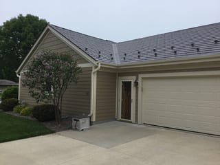 Colonial Brown Interlock Slate aluminum roof on a Colonial brown home with two storeys in a suburban setting, Port Washington, Wisconsin