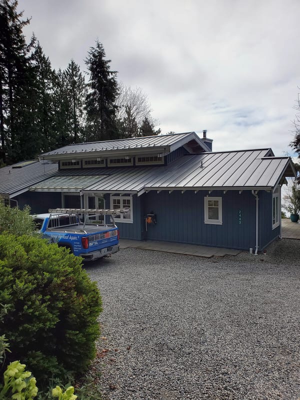 Interlock Aluminum Standing Seam Metal Roofing – Deep Charcoal | Roberts Creek, BC (Front-right elevation)